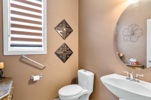 223 Sunset Square, Cochrane, AB - Indoor Photo Showing Kitchen With Upgraded Kitchen