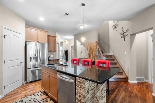 223 Sunset Square, Cochrane, AB - Indoor Photo Showing Living Room