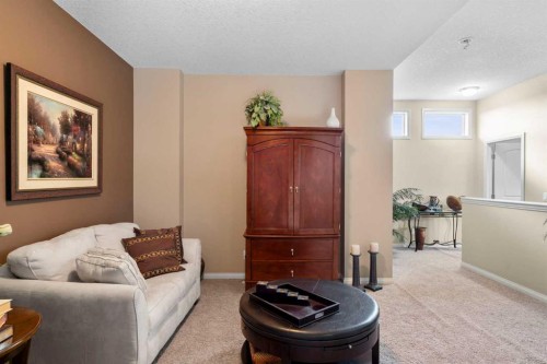 223 Sunset Square, Cochrane, AB - Indoor Photo Showing Bedroom