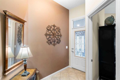 223 Sunset Square, Cochrane, AB - Indoor Photo Showing Kitchen With Double Sink