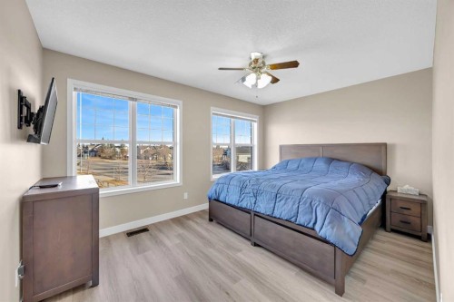 71 Eversyde Heath Sw, Calgary, AB - Indoor Photo Showing Bedroom