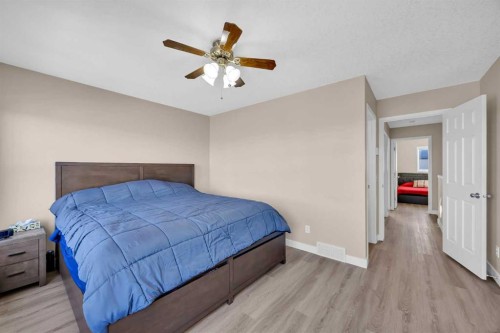71 Eversyde Heath Sw, Calgary, AB - Indoor Photo Showing Bedroom