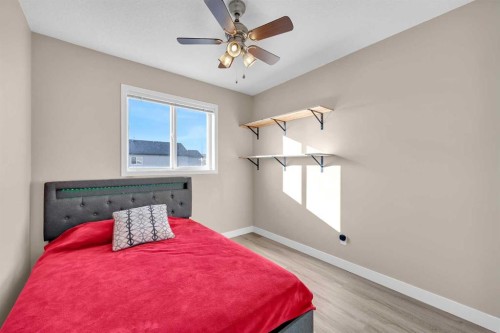 71 Eversyde Heath Sw, Calgary, AB - Indoor Photo Showing Bedroom