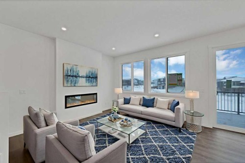 569 Chelsea Gardens, Chestermere, AB - Indoor Photo Showing Living Room With Fireplace
