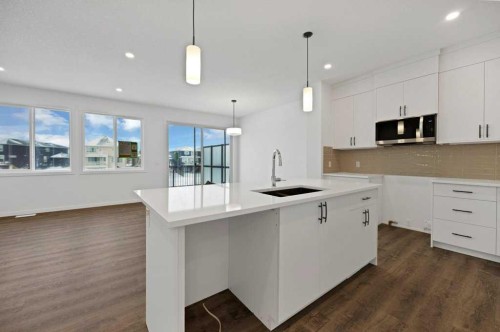 569 Chelsea Gardens, Chestermere, AB - Indoor Photo Showing Kitchen With Upgraded Kitchen