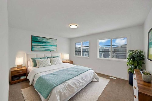 569 Chelsea Gardens, Chestermere, AB - Indoor Photo Showing Bedroom