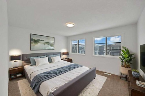 569 Chelsea Gardens, Chestermere, AB - Indoor Photo Showing Bedroom