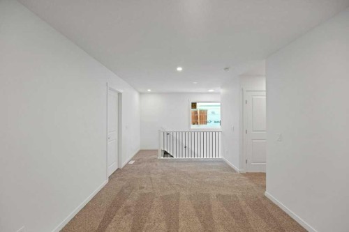 569 Chelsea Gardens, Chestermere, AB - Indoor Photo Showing Other Room