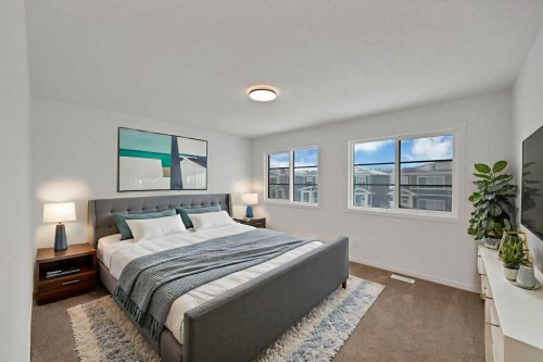 569 Chelsea Gardens, Chestermere, AB - Indoor Photo Showing Bedroom