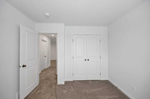 569 Chelsea Gardens, Chestermere, AB - Indoor Photo Showing Other Room