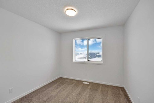 569 Chelsea Gardens, Chestermere, AB - Indoor Photo Showing Other Room