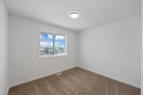 569 Chelsea Gardens, Chestermere, AB - Indoor Photo Showing Other Room