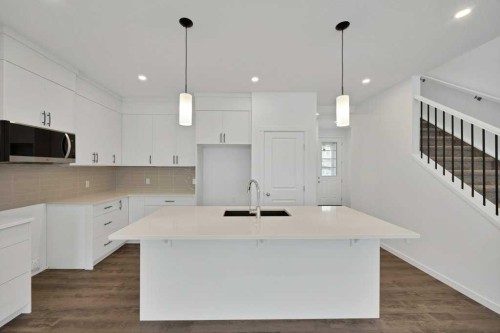 569 Chelsea Gardens, Chestermere, AB - Indoor Photo Showing Kitchen With Upgraded Kitchen