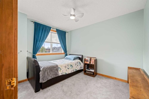 122 Hidden Creek Heights Nw, Calgary, AB - Indoor Photo Showing Bedroom