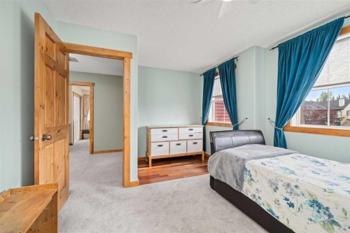 122 Hidden Creek Heights Nw, Calgary, AB - Indoor Photo Showing Bedroom