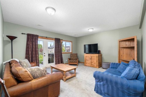 122 Hidden Creek Heights Nw, Calgary, AB - Indoor Photo Showing Living Room