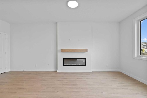 175 Belvedere Crescent Se, Calgary, AB - Indoor With Fireplace