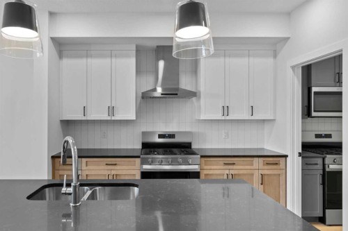 175 Belvedere Crescent Se, Calgary, AB - Indoor Photo Showing Kitchen With Double Sink