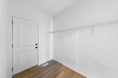 82 Versant Rise Sw, Calgary, AB - Indoor Photo Showing Other Room
