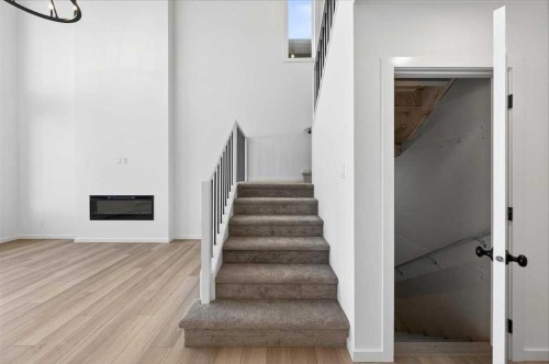 82 Versant Rise Sw, Calgary, AB - Indoor Photo Showing Other Room