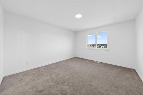 82 Versant Rise Sw, Calgary, AB - Indoor Photo Showing Other Room
