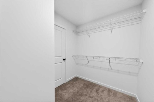 82 Versant Rise Sw, Calgary, AB - Indoor With Storage