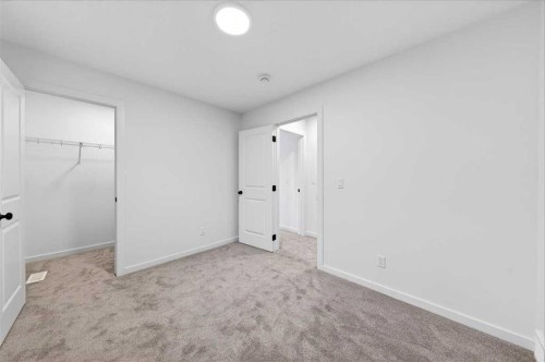 82 Versant Rise Sw, Calgary, AB - Indoor Photo Showing Other Room