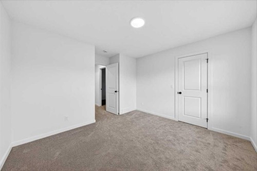 82 Versant Rise Sw, Calgary, AB - Indoor Photo Showing Other Room