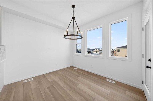 82 Versant Rise Sw, Calgary, AB - Indoor Photo Showing Other Room