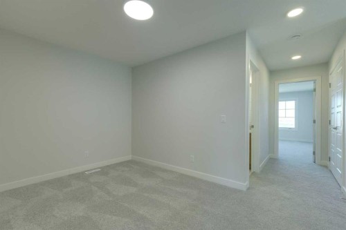 92 Amblefield View Nw, Calgary, AB - Indoor Photo Showing Other Room