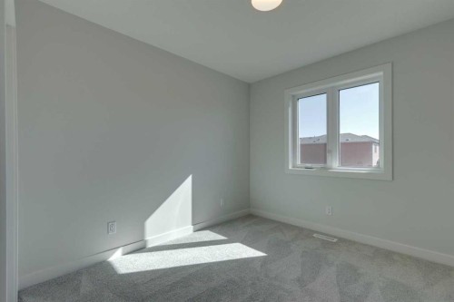 92 Amblefield View Nw, Calgary, AB - Indoor Photo Showing Other Room