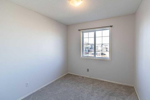13 Coville Gardens Ne, Calgary, AB - Indoor Photo Showing Other Room