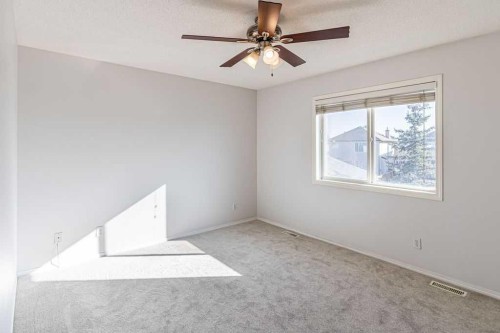 13 Coville Gardens Ne, Calgary, AB - Indoor Photo Showing Other Room