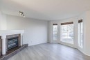 13 Coville Gardens Ne, Calgary, AB  - Indoor Photo Showing Living Room With Fireplace 