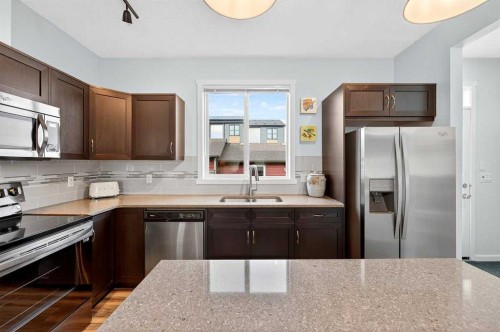 82 Mahogany Drive Se, Calgary, AB - Indoor Photo Showing Kitchen With Stainless Steel Kitchen With Double Sink