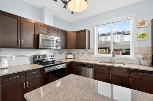 82 Mahogany Drive Se, Calgary, AB - Indoor Photo Showing Kitchen With Stainless Steel Kitchen With Double Sink