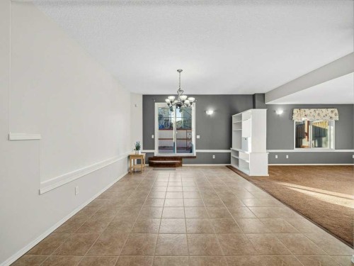 106 Springs Place Se, Airdrie, AB - Indoor Photo Showing Other Room