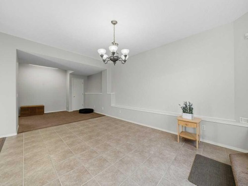 106 Springs Place Se, Airdrie, AB - Indoor Photo Showing Other Room