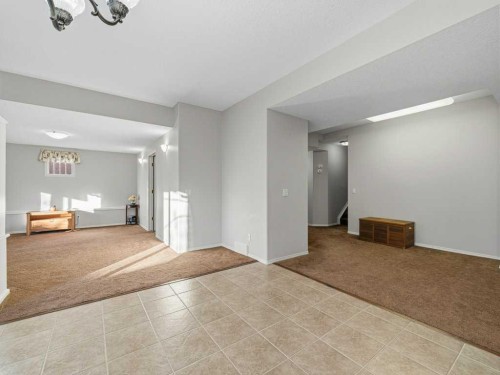 106 Springs Place Se, Airdrie, AB - Indoor Photo Showing Other Room