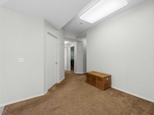 106 Springs Place Se, Airdrie, AB - Indoor Photo Showing Other Room