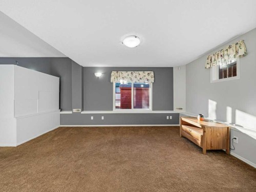 106 Springs Place Se, Airdrie, AB - Indoor Photo Showing Other Room