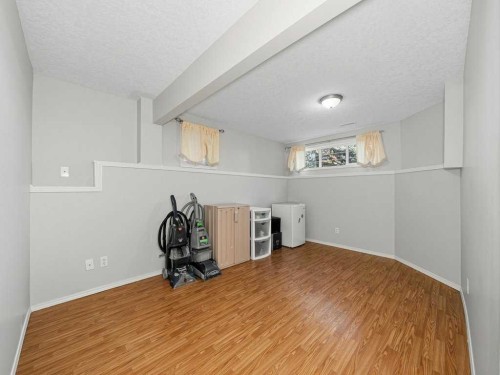 106 Springs Place Se, Airdrie, AB - Indoor Photo Showing Other Room