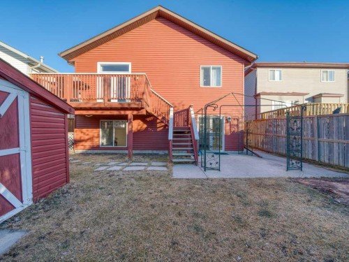 106 Springs Place Se, Airdrie, AB - Outdoor With Deck Patio Veranda With Exterior