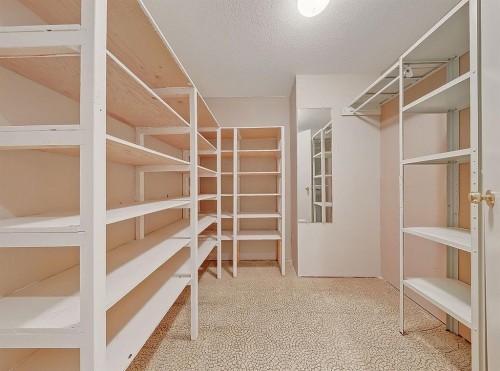 44 Granlea Place Sw, Calgary, AB - Indoor With Storage