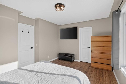 107 Mt Allan Circle Se, Calgary, AB - Indoor Photo Showing Bedroom