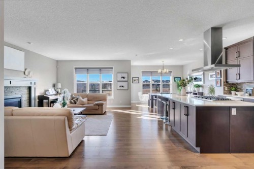 53 Sundown Grove, Cochrane, AB - Indoor With Fireplace
