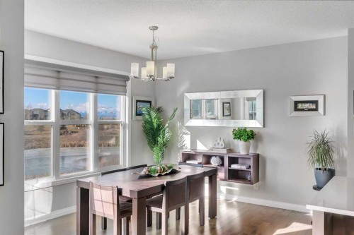 53 Sundown Grove, Cochrane, AB - Indoor Photo Showing Dining Room