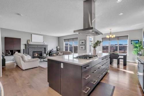 53 Sundown Grove, Cochrane, AB - Indoor With Fireplace