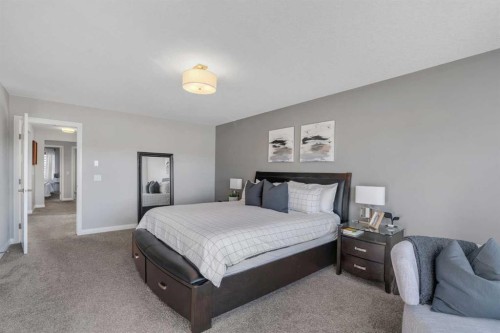 53 Sundown Grove, Cochrane, AB - Indoor Photo Showing Bedroom
