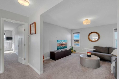 53 Sundown Grove, Cochrane, AB - Indoor Photo Showing Living Room